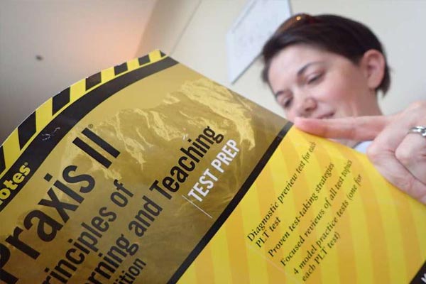 Woman reading testing booklet